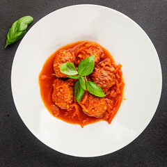 Meatballs tomato sauce beef, pork or chicken meat fresh delicious gourmet food background on the...