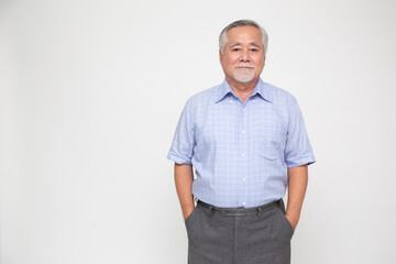 Senior asian man standing isolated over white background, Mature businessman and looking at camera