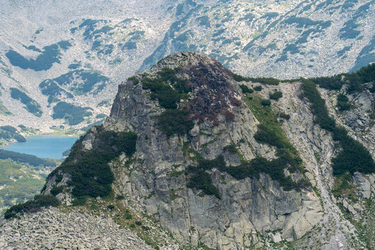 Aerial view of a cliff in Pirin National Park, Bulgaria, taken from the hiking trail leading to Muratov peak.