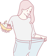 A joyful woman shows off her impressive weight loss achievement surrounded by vibrant, healthy fruits