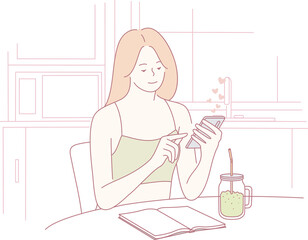 A relaxed woman enjoys scrolling through her smartphone while sipping a refreshing drink at her home, blissfully