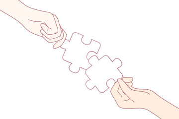 Two hands skillfully joining together puzzle pieces, symbolizing teamwork, connection, cooperation, and partnership