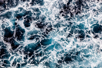 Ocean surface background. Top view of beautiful foamy water. Can be used in covers, packaging, posters, textures, banners, art and design projects. Creative vector illustration.