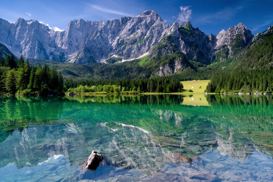 Beautiful Lake Fusine Superiore and mount Mangart, Julian Alps, Tarvisio, Udine province, Friuli Venezia Giulia, Italy.	
