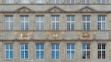 Fragment of old ornate building facade