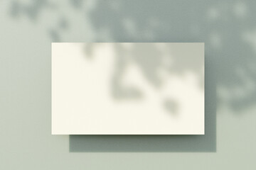 Blank card with soft shadow on textured surface. 3d rendering