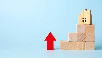 Rising house value concept depicted with wooden blocks