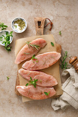 Meat. Raw turkey tenderloin meat, turkey steaks with ingredients for cooking, top view