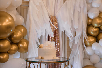 Elegant First Birthday Cake with Gold Balloons and White Backdrop, Celebration Theme, Party Decor,...