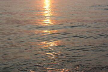 the shimmer of the sea at sunset in thailand