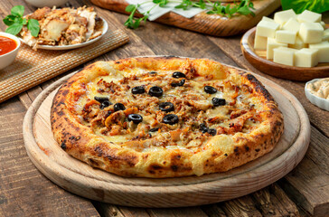 Shawarma pizza fusion between Italian and Arabic food styles
