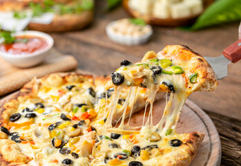 Authentic Italian pizza with mozzarella cheese close-up pizza slice