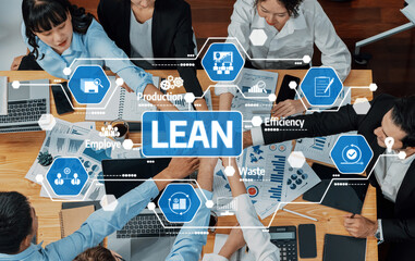 A dynamic overhead view of a diverse team engaged in lean management, emphasizing collaboration, productivity, and efficiency in a contemporary office environment. Amity