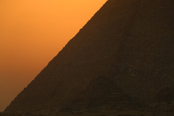 sunset over the egyptian pyramid