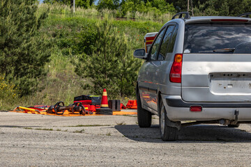 The accident site after the rescue operation, with the equipment for cutting the car