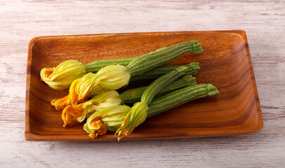 Raw mini zucchini with flowers