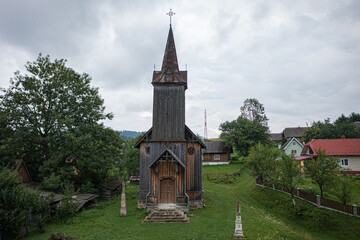 Old Wooden Church with Steeple and Cross