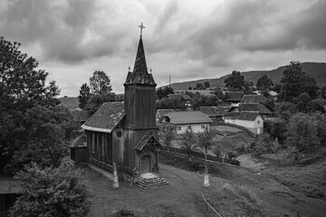 Old Wooden Church with Steeple and Cross