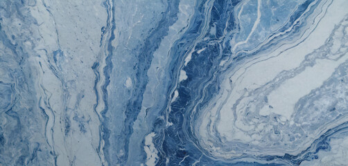 Close-up of blue and white marble texture with intricate veining.