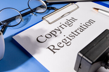 Copyright Registration Document in Clipboard Set on the Desk – Intellectual Property Law Concept