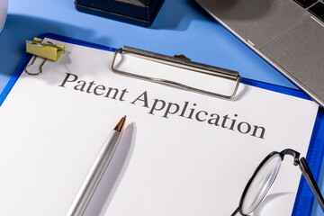 Patent Application Form on Clipboard &ndash; Intellectual Property Law Office Setup