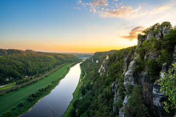 Explore the breathtaking landscape of Bastei during a vibrant sunset