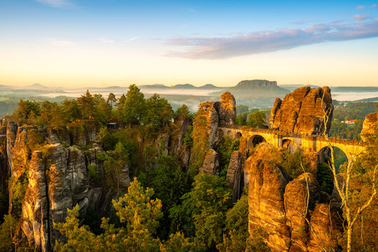 Capturing the breathtaking views of Bastei rock formations at sunrise in Saxon Switzerland
