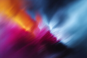 Dynamic abstract artwork featuring vibrant streaks of orange, pink, and blue.  This highenergy image evokes feelings of motion, speed, and energy, perfect for technology, music, or design projects.