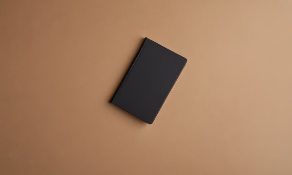 Elegant Black Notebook on Neutral Background, Ideal for Mockups and Branding
