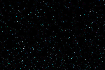 Stars in the night. Galaxy space background. Dark blue starry night sky. Stars falling in the loop.