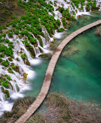 Exploring the tranquil waters and lush greenery of Plitvice Lakes in Croatia during spring