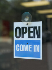 open, come in, sign on the door