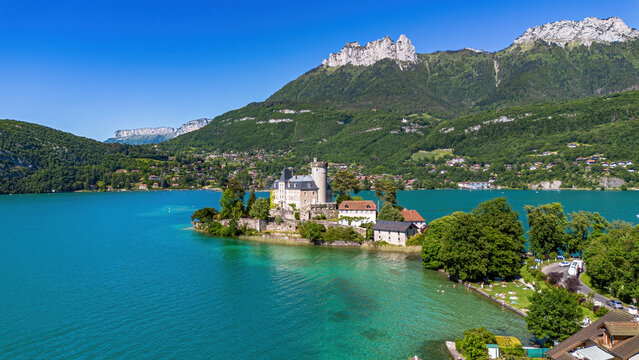 Aerial view of the Ch&acirc;teau de Duingt (Duingt Castle) on an island connecter to the shore of Lake Annecy by a causeway in Haute Savoie, Auvergne-Rh&ocirc;ne-Alpes, France