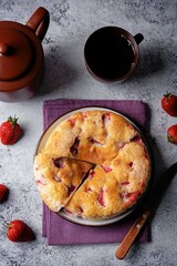 Cake with strawberries in a plate