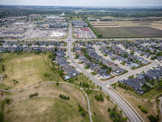View of a residential area with houses and a park