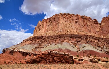 colorful, eroded cliffs and rock formations on a sunny summer day in capitol reef national park, near torrey, utah