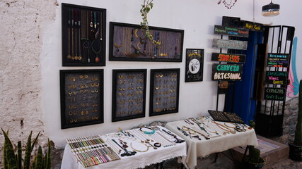 A display of local jewelry in the city of Cusco, Peru