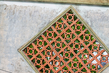Ornate Terracotta Lattice Window Architectural Detail Weathered Wall Asian Design Element