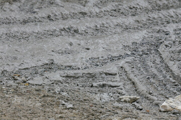 Muddy Terrain Texture Closeup Gray Soil Ground Wet Earth Surface Background Image