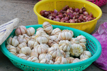 Fresh Garlic and Shallots at Asian Market Vibrant Colors and Textures of Organic Produce Healthy Food Ingredients for Cooking
