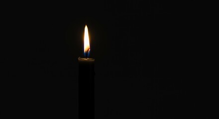Candle Flame Burning Brightly in the Dark Still Life