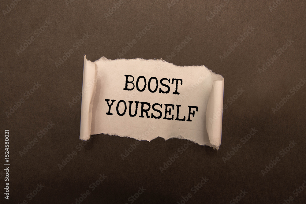 Poster sheet of paper on an envelope on a red notepad. calendar. text boost yourself