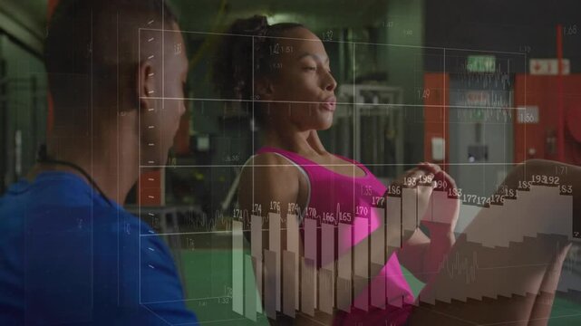 Client starting V-sit crunches on green mat trainer counting and chart rising for health monitoring