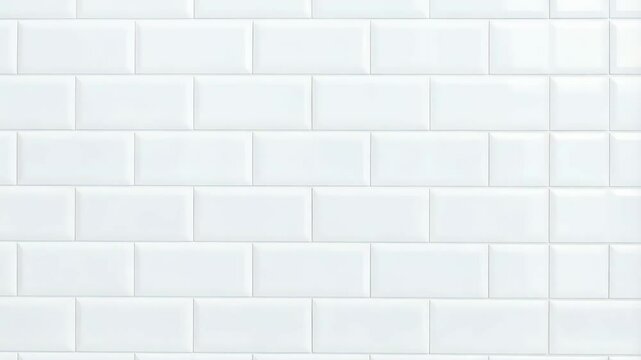 Bright white glazed ceramic subway tiles arranged horizontally creating a clean, symmetrical pattern on a wall for modern design.