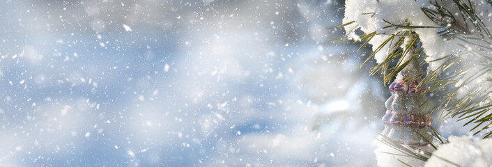 Christmas Tree decorating. Winter wonderland. Idyllic nature with falling snow. Banner with copy...