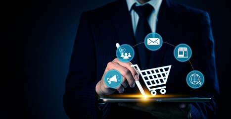 Businessman using digital tablet with e-commerce icons, modern online shopping, digital marketing...