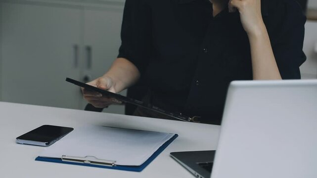 Two asian team working development of programming and encryption technology website design programmers on desk in office