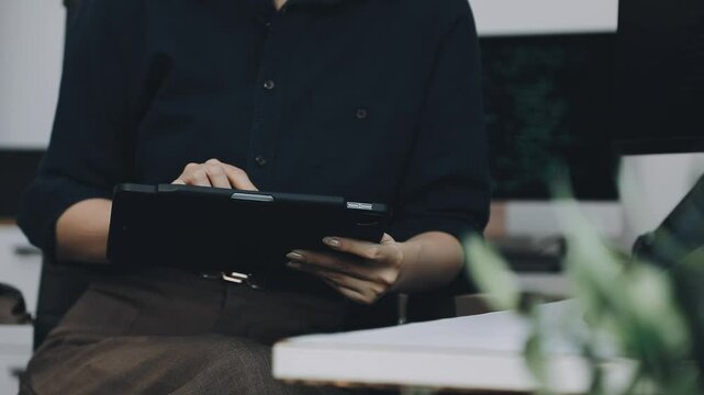 Two asian team working development of programming and encryption technology website design programmers on desk in office