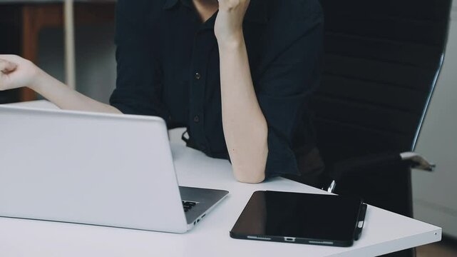 Two asian team working development of programming and encryption technology website design programmers on desk in office