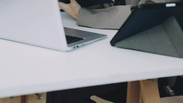 Two asian team working development of programming and encryption technology website design programmers on desk in office